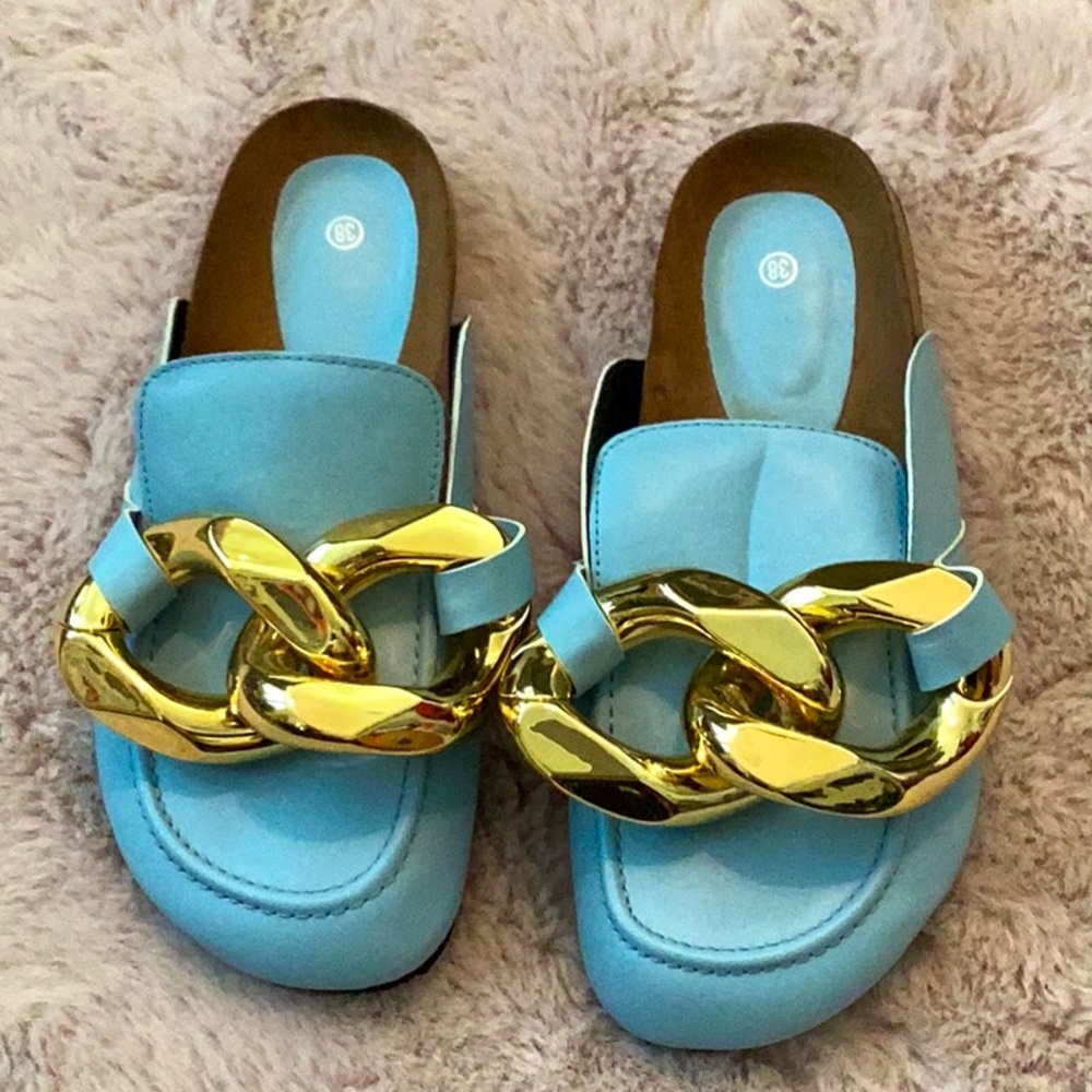 Cute light blue clogs.
